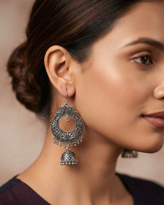 Ornate Oxidised Silver Peacock Jhumka Earrings - Chahna