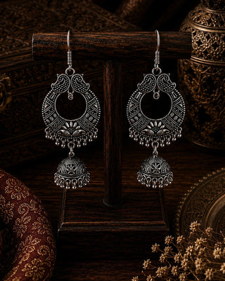 Ornate Oxidised Silver Peacock Jhumka Earrings - Chahna