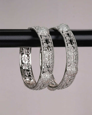 Carrie Silver Plated AD Bangles displayed with formal attire - Hanger Product Image