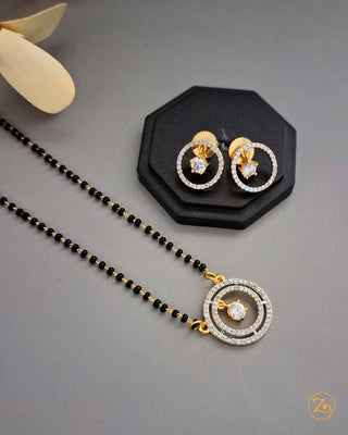 Jewelry set with necklace and earrings on a gray background