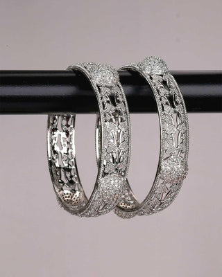 Carrie Silver Plated AD Bangles displayed with formal attire - Hanger Product Image
